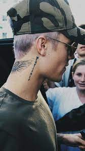 Hollies And Red Berries Beautiful Winter Diy Wedding Center Piece Picture For You Justin Bieber Tattoos Justin Bieber Wallpaper Justin Bieber