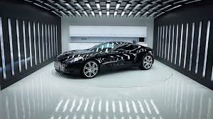 Aston Martin One 77 Latest Hd Wallpapers Free Download Car Showroom Interior Car Showroom Design Luxury Garage