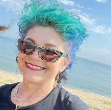 Where to stay with 8 people? We also need a place to park a 15-passenger  van (usually too tall for parking garages). Thanks!