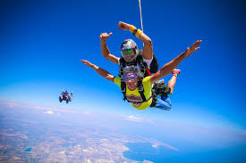 The minimum age for tandem skydiving is 16 years old. Tandem Jump Skydive Sicilia