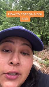 Kid Taking Off Tire with Giant Wrench