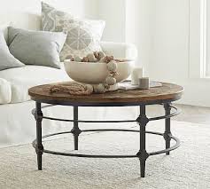 It's made from solid pine. Parquet 36 Round Reclaimed Wood Coffee Table Pottery Barn