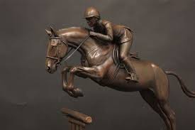 bronze hunter sculpture commissioned to serve as trophy for michigan hunter jumper association horses horse galloping black horses