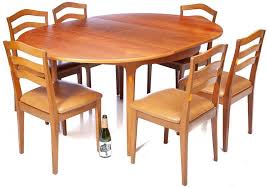 Metal handles and alternative ash handles matching the top, come with every piece. Teak Table By Nathan With 6 Chairs Vogt Auction