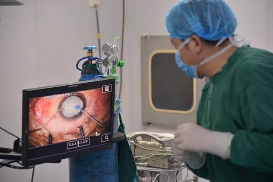 Experienced ENT surgeon performing hands on surgical care in the operating room at his practice 