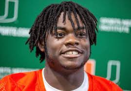 Miami DE Patchan surprises two-time UM national champion dad
