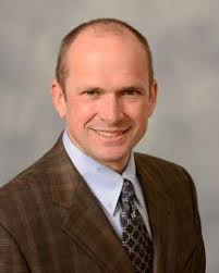 Gregory L. Schumacher, M.D.