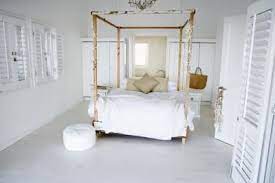 How to make a diy canopy bed frame. How To Decorate Walls Around An Off Center Window Above A Bed Canopy Bed Frame Wood Canopy Bed Canopy Bed Diy