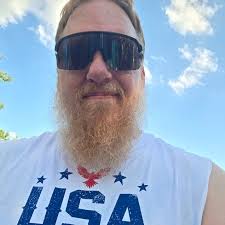 Truck driver used double tree parking lot to turn around, drove over a curb  and drug two massive boulders from Doubletree to Freddy's