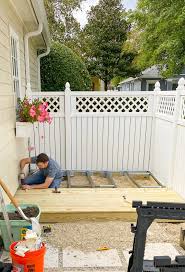 Building a covered deck next to your home can add a great deal to both its value and to your enjoyment of it. How To Build A Backyard Deck Diy Ashley Brooke Designs