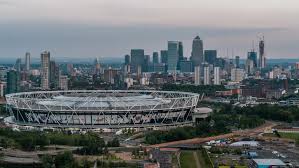 The name west ham united in large letters on the roof is clearly visible from far away. Aerial View Of Olympic Stadium Stock Footage Video 100 Royalty Free 1015905211 Shutterstock