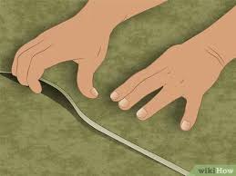 Carefully lift back both edges of the carpet and apply a thin bead of seam sealer along the cut edge of one piece. How To Seam Carpet With Pictures Wikihow