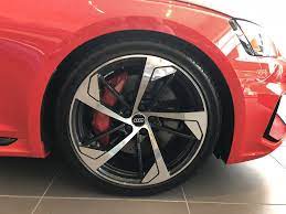 Tire And Rim On The 2018 Audi Rs5 In Misano Red Pearl Vehicle Available At Audi Of Bridgewater Nj Used Luxury Cars Audi Dealership Audi