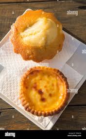 Portuguese Pastel De Nata Cream Tart And Magdalena Cake Portugal Stock Photo Alamy