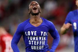 England winger raheem sterling ripped off his shirt after scoring against hungary in a world cup qualifying match on thursday to pay tribute . 69io7ibu9dyq5m