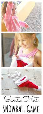 Santa Hat Christmas Game Throw Snowballs Into The Santa Hat Christmas Games Santa Hat Diy Party