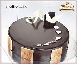 Birthday Cake Ribbons And Balloons Cake Images Ribbons Balloons Truffle Cake Will Leave Your Senses Mesmerised With Taste Of Pure Chocolate Topped With Chocolate Ganac Cake Chocolate Topping Cake Truffles