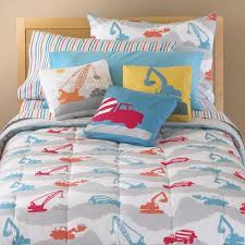 That's because the quilt is adorned with some of kids' favorite big machines, including bulldozers, cranes and more. Construction Zone Bedding For Boys