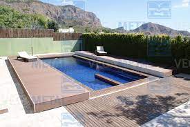 To protect your cover, we use a vinyl laminate formula to provide even coverage that minimizes the risk of water exposure. Motorized Flat Pool Enclosure Slide Vegametal Videos Small Swimming Pools Swimming Pools Backyard Pool
