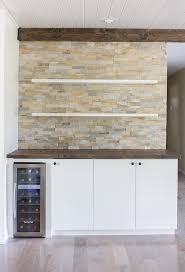 Floating shelves can enhance any area. Kitchen Chronicles Stacked Stone Bar Wall Diy Floating Shelves