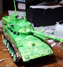 Also, remember you can go to the design tab and add a theme, colors. I Made This Tank Out Of Index Cards Papercraft