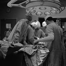 Surgical Team Of Five Huddled Together Operating On Patient Photographic Print H Armstrong Roberts Art Com In 2020 Medical Medicine Student Medical Careers