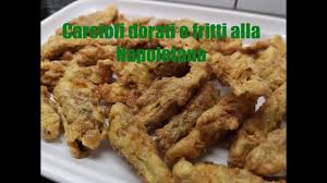 Dovete, innanzitutto, preparare la pastella per fritti, immergere i fiori all'interno e poi procedere alla frittura. Carciofi Dorati E Fritti Alla Napoletana Youtube