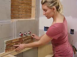 How do you build a stacked stone wall? How To Install Stacked Slate Tiling In A Bathroom How Tos Diy