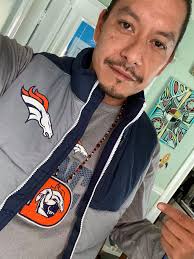 Wearing all my gear 🏈🧡💙