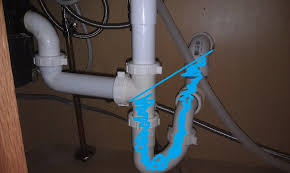 replumbing an improper trap.  home