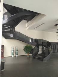Concrete stairs and black steel railing. Awesome Europe Grey Glass Balustrade Curved Stairs Helical Staircase Modern Staircase Other By Demax Staircase Railing Houzz Uk