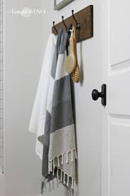 Standard wine bottles are roughly the same size as a rolled up bath towel, so wine racks double up nicely as bathroom towel storage. Diy Towel Rack Remington Avenue