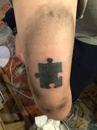Many puzzle piece tattoos feature interlocking pieces in different bright, bold colors to represent the diverse and unique ways each individual with autism is affected by the disease. Caspes Puzzle Piece Stick And Poke For Autism Awareness