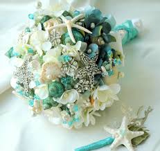 This is an easy diy wedding project that will add elegant nautical style to a basic bouquet or floral arrangement. Sea Shell Bridal Bouquet Seashell Bouquettiffany Blue Etsy Shell Bouquet Bridal Brooch Bouquet Bridal Bouquet