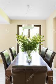 Check spelling or type a new query. Wenge Dining Table Leather Chairs Flowers In Vase And Pendant Stock Photo Picture And Royalty Free Image Image 68548785