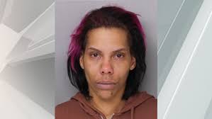 Police say woman threatened to shoot up government office