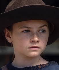 Katelyn portrays the quiet and mysterious teenager enid, whom carl (played by chandler riggs) meets shortly after arrival in the safe zone of alexandria. Judith Grimes Tv Series Walking Dead Wiki Fandom