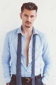 One of the worst style mistakes you can commit is to show your undershirt when you wear your shirt unbuttoned or when the lines show underneath your dress shirt. Disappointed Male Manager In Unbuttoned Shirt Stock Photo Picture And Royalty Free Image Image 90374107