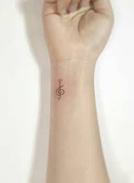 Gone are the days when people who have tattoos done on their body are considered as rebellions. Pin By Carey Waterman On Tattoos Music Tattoos Small Tattoos Small Music Tattoos