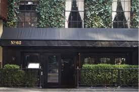 Very Simple But Classy Awning With Name In Gold On The Front Of The Awning Black Doors Restaurant Exterior Awning