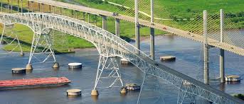 The rainbow bridge is a cantilever bridge crossing the neches river in southeast texas just upstream from sabine lake. State Highway 73 Rainbow Bridge Mccarthy Building Companies