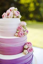 Browse through our exquisite flowers and cakes combo to send your dear ones as a token of love.</p> Pink And Purple Colored Wedding Cakes Arabia Weddings