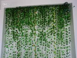 These fake ivy wall not only make your decor seem aesthetically appealing but also give you a feeling of greenery all around you. 250cm Length Artificial Silk Plastic Simulation Climbing Vines Green Leaf Ivy Rattan For Home Decor Bar Restaurant Deco Artificial Vines Fake Vines Vines Decor
