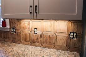 Real wood is easy to deform in water, while wood look tile is not only cheaper than real wood, but also in low absorption: Diy Kitchen Backsplash From Wood Tiles Budget Faux Tile Backsplash