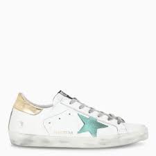 De cycleur de luxe sneakers kent iedereen. Golden Goose Deluxe Brand White Gold Green Superstar Sneakers Accuweather Shop