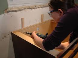Extending kitchen cabinets to the ceiling is a great way to increase cabinet storage space and make your kitchen appear larger. Kitchen Catch Up How To Install Cabinets How Tos Diy