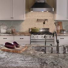 The glass backsplash trend is spreading like wildfire across kitchen remodels in america, and for good glass can accumulate dirt and dust over time, but can be easily cleaned with any general tile. Timeless Glass Tile Backsplashes That Never Go Out Of Style