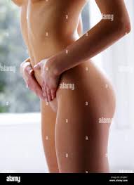Beautiful naked woman standing Stock Photo - Alamy