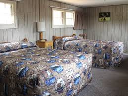It is listed on the park's register of historic places as the oldest standing yellowstone hotel. Lake Lodge Pioneer Cabin Two Beds 01
