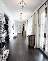 We have partnered with networx to help our readers get affordable dark wood flooring quotations from contractors near them. Top 60 Best Hallway Lighting Ideas Interior Light Fixtures Living Room Wood Floor Dark Wood Floors Living Room Living Room Hardwood Floors